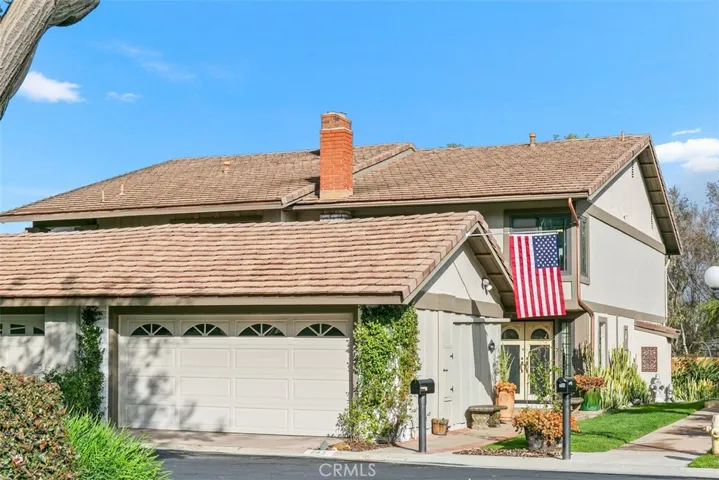 Two car garage with tons of storage and cabinets