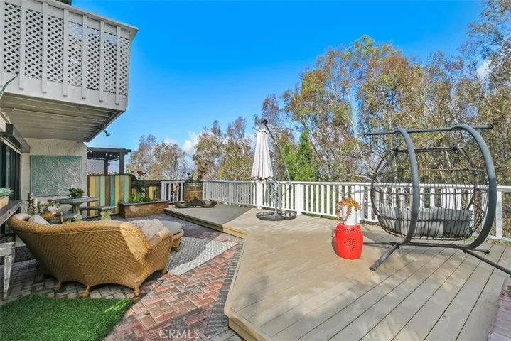 This DECK is paradise. It's so nice and big with a gas BBQ. The views beyond those trees are simply breathtaking.