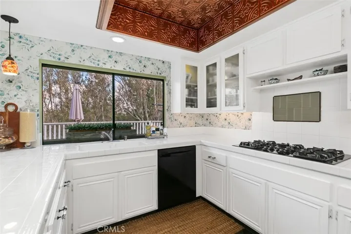 Gorgeous picture window from the sink looking out onto the back deck.