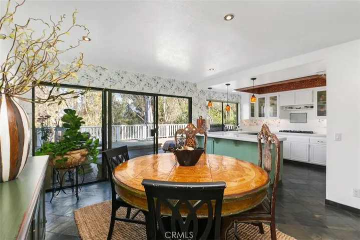 Wonderfully large dining room that easily seats 8-10 people with larger table. Look at that open feeling you get with the deck off of this room.