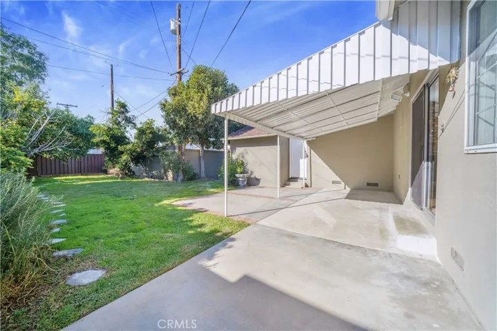 Backyard with Metal-Covered Patio