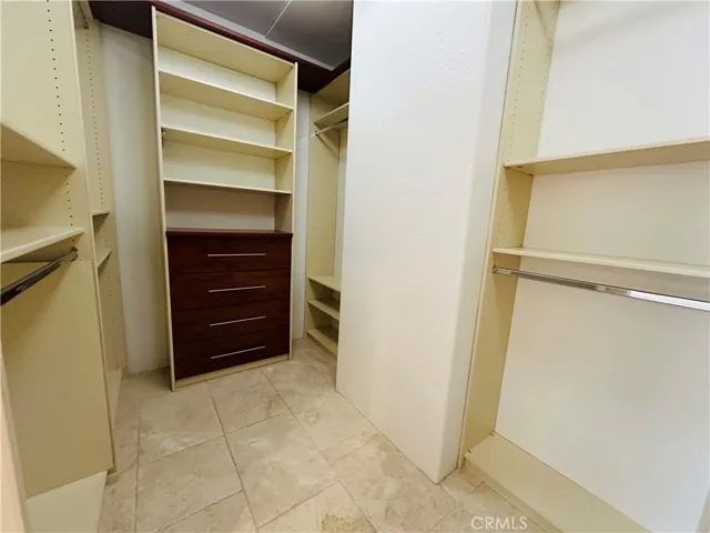 Walk-in closet with closet organizers
