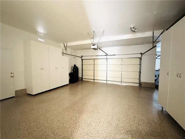 Finished 3 car garage with lots of cabinets