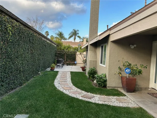 Walk way from front door to patio
