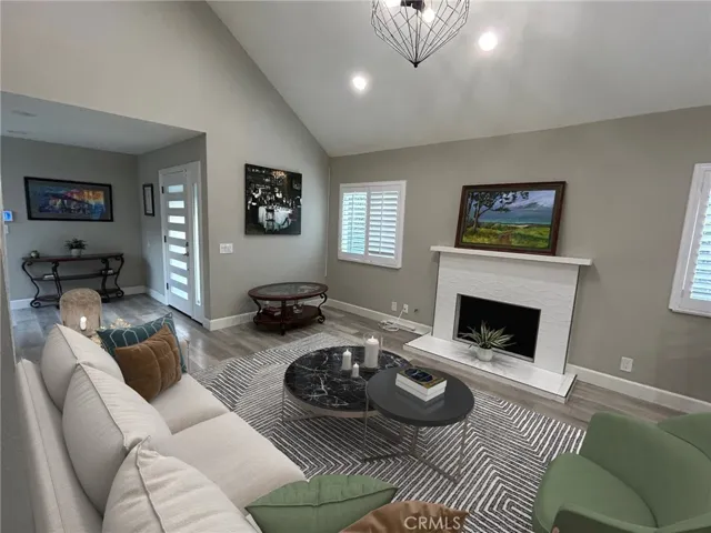 Virtually staged view of entry and LR