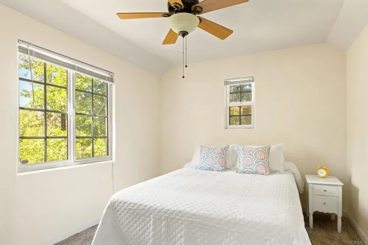 Bright and spacious 1st floor bedroom with ceiling fan