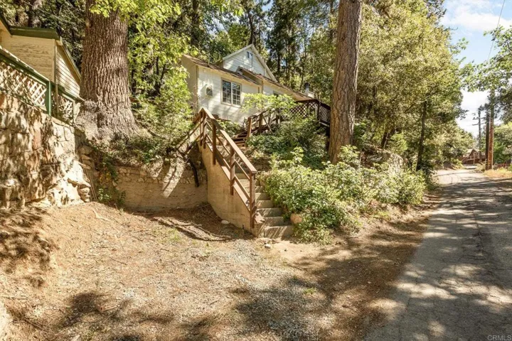 Parking space next to stairs to cottage entrance