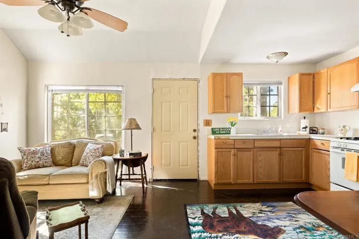 Entrance area with beautiful original wood flooring and double pained aluminum windows
