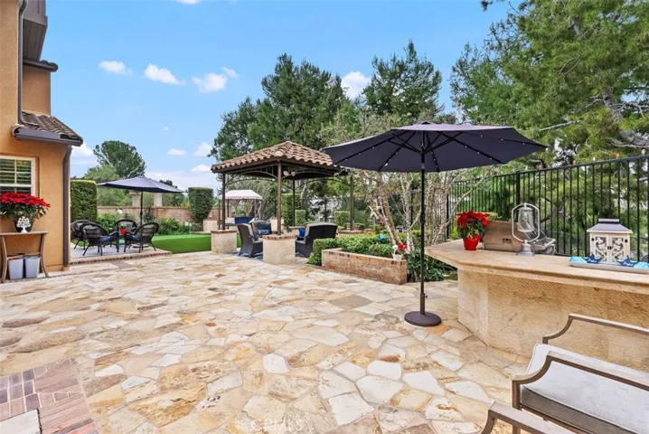 Shows width of this yard.  Lots of room for games etc.