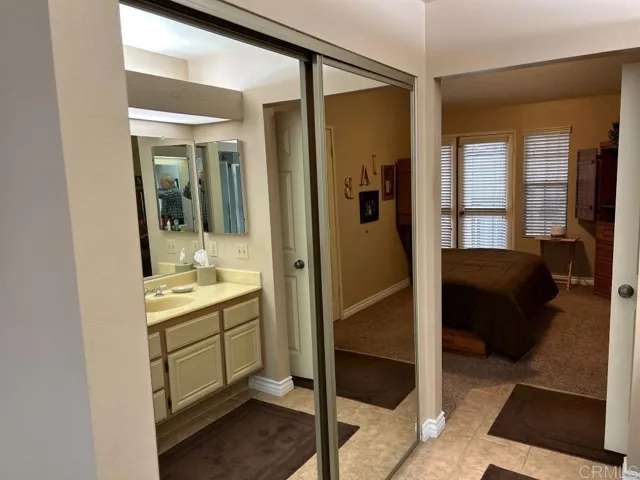 Mirrored doors on WI closet-mbath