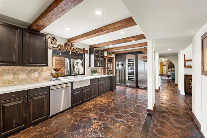 Uprgraded kitchen with built in fridge and wine fridge