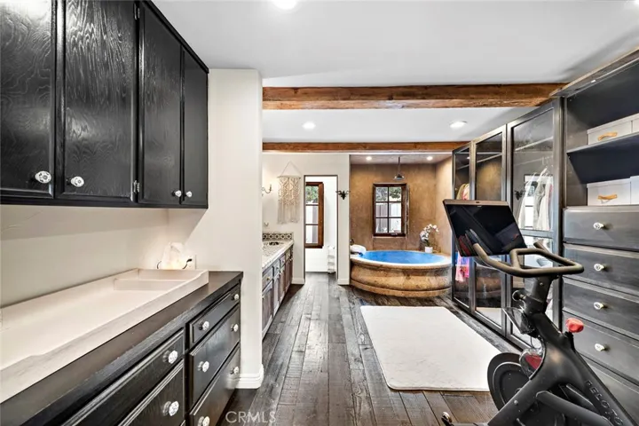 primary bathroom/walk in closet area is perfect for your mini gym