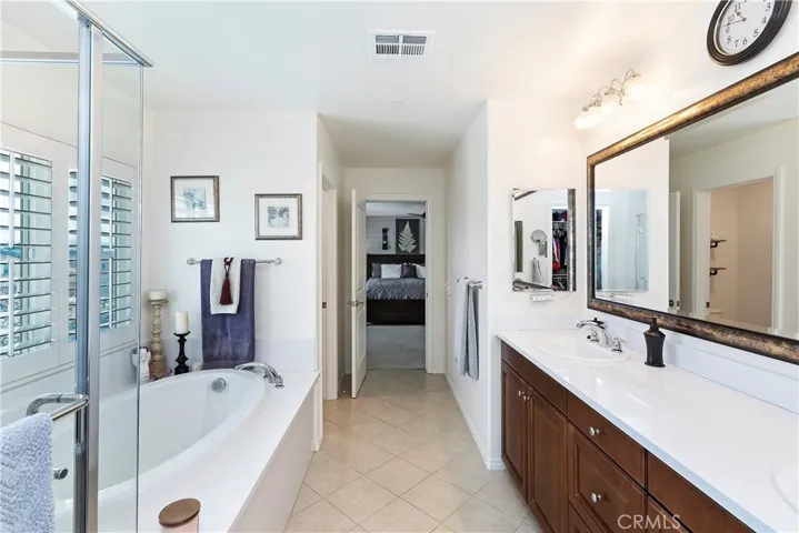 Separate Tub and Shower in this Bright Bathroom!