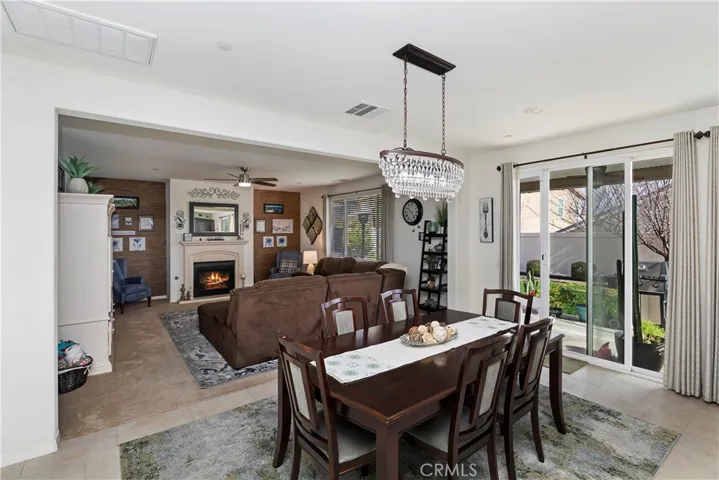 Cozy Family Room Open to Dining Area