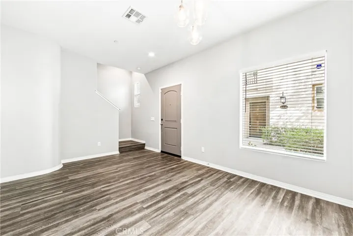 Looking at the front door from the garage access door.