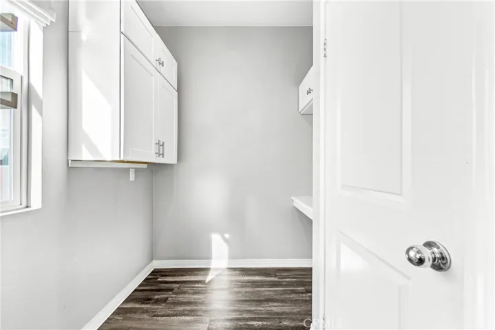 Walk-in pantry has room for storage or an office.