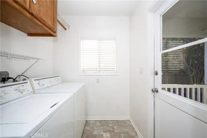 Laundry room adjacent to kitchen
