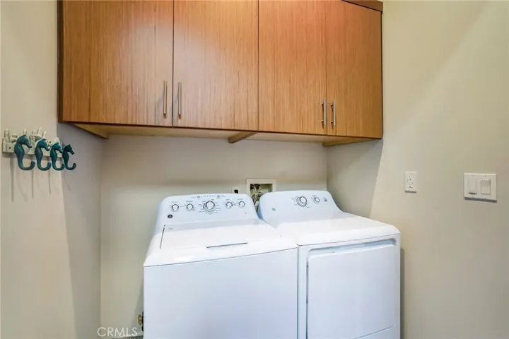 Separate laundry room downstairs.