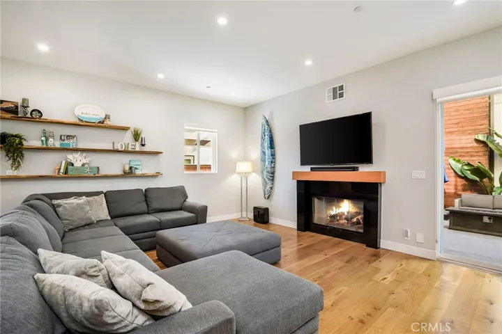 Cozy fireplace and tall ceilings make your home feel large.