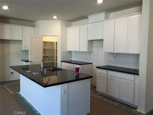 Kitchen with Island and Pantry