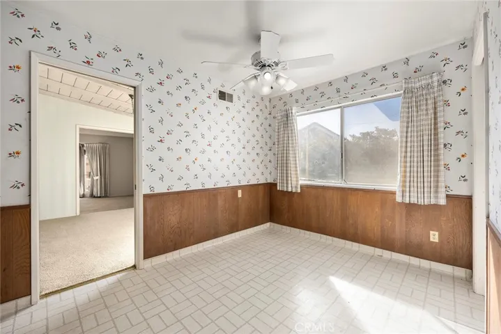 Kitchen nook with view of the formal dining room