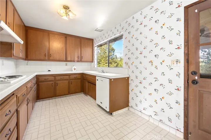 Kitchen window has a great view of the backyard and is used as a pass thru window