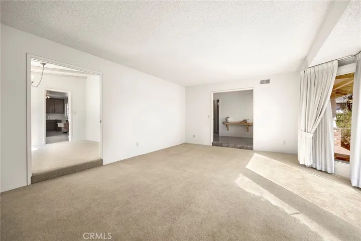 View of living room looking into the formal dining room