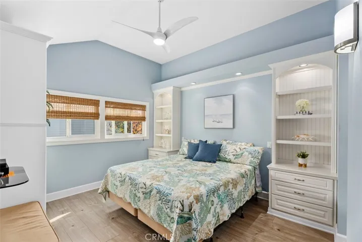 Light and spacious primary bedroom with built-ins