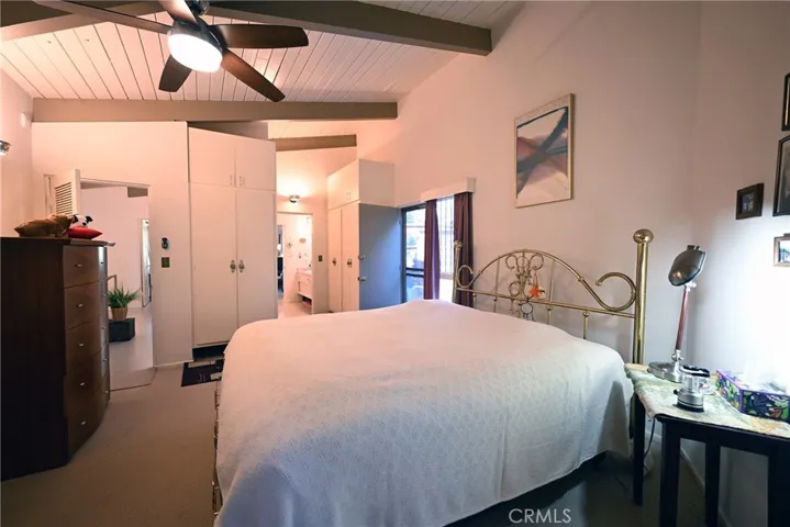 Main bedroom with door to patio.