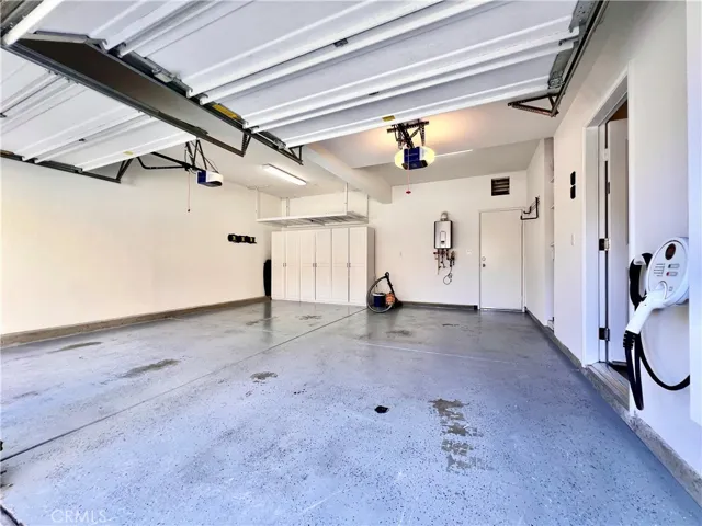 Garage, waterless hot water tank, EV charger