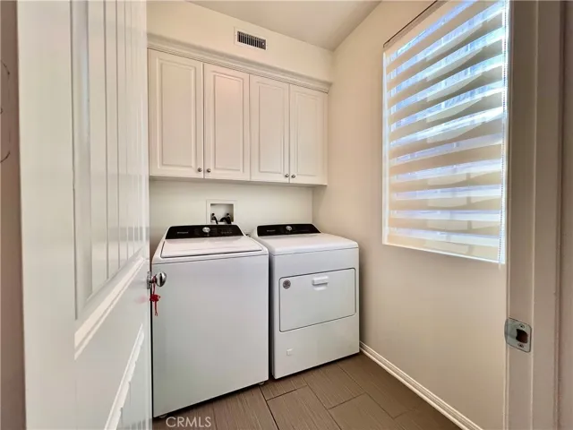 Downstairs Laundry room with brand new Washer and Dryer
