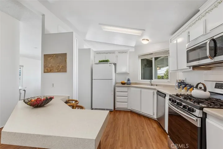Easy to entertain and visit from the kitchen as it opens to the family room.