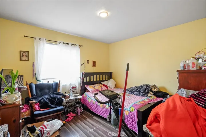 Bedroom 1- with laminate flooring, and good space closet