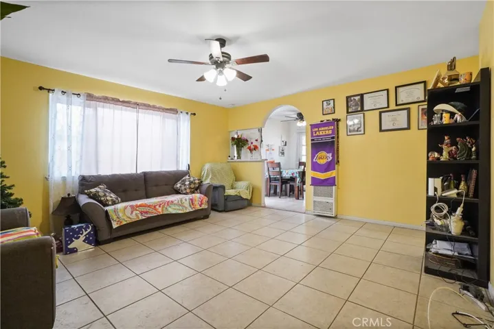 Spacious living room adjacent to dining area & kitchen