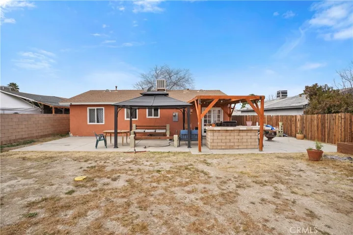 View of backyard facing the back of the home.