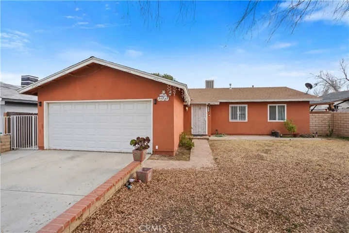 37222 Cedrela Ave, Palmdale- Beautiful gated home offering 3 bedrooms, 2 bathrooms + Bonus guest uni