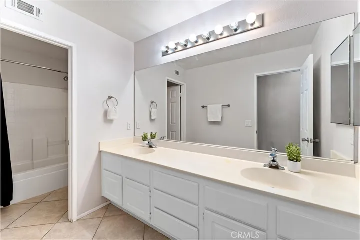 Bathroom 3 - dual sink, tub and shower (upstairs)