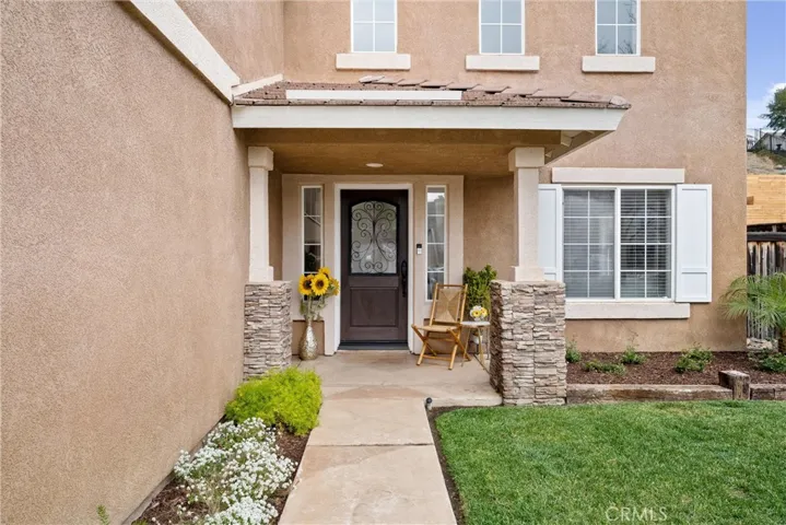 Beautifully landscaped front entry welcomes you home!