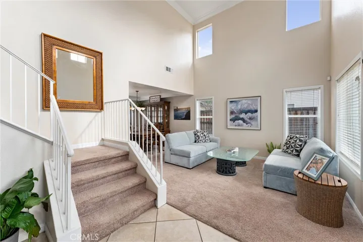 Soaring ceilings, formal living room, formal dining room