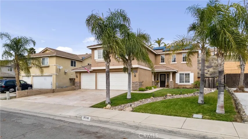 Oversized driveway and 3 car garage
