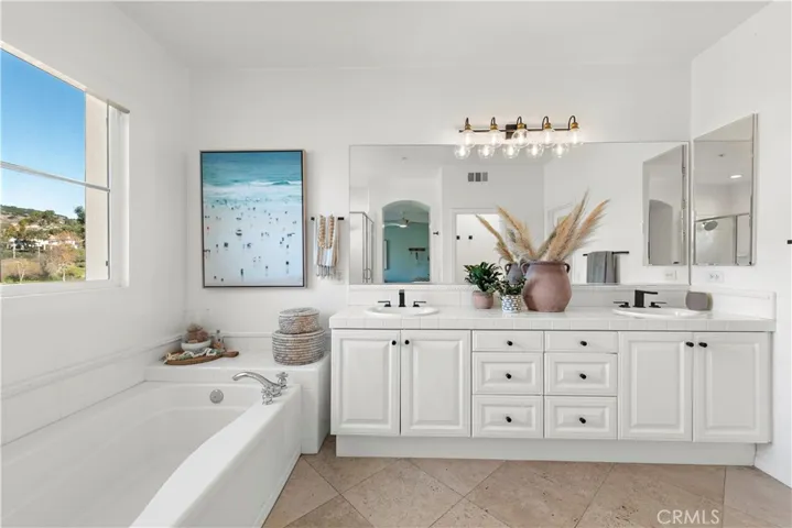 Large Primary Bathroom with Double Sinks.