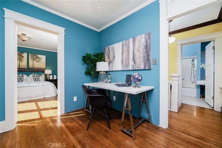 Wide angel showing bathroom office connected to the hallway and secondary master.  This can be a standalone bedroom.