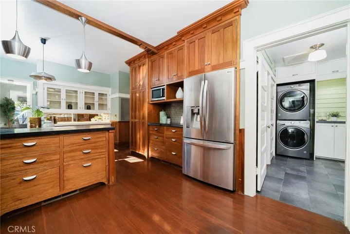 Wide angel of Kitchen leading into Laundry