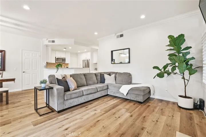 The living room and kitchen.