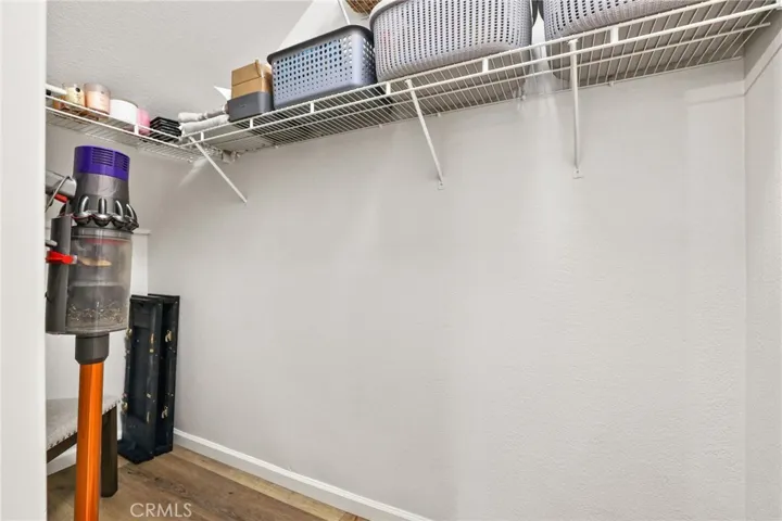 There is access to a deep storage closet behind the dining room.