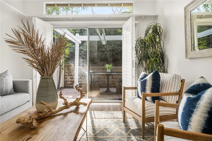 Two-story ceilings and clearstory window keep this home full of light all day.