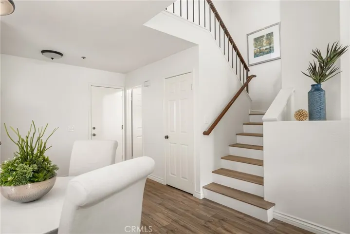 Behind the stairs is the guest bath