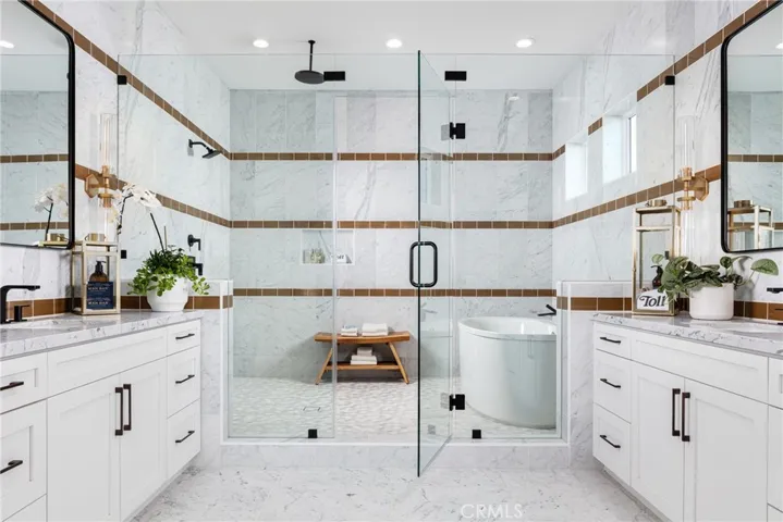 Primary Bathroom with tub and shower
