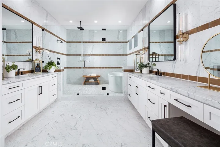 Primary Bathroom with tub and shower