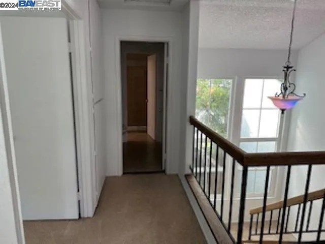 Hallway to upstairs hall bathroom